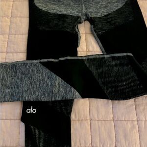 ALO ankle length bottoms. Black and gray. Size SMALL